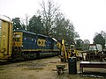 CSX SD40-2 8449, seen in Senatobia, Mississippi, on former IC rails pulling an auto train with the "dark future" paint scheme