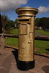 The Olympic gold pillar box at Kirkby-in-Ashfield, Nottinghamshire.