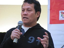 Rey Fortaleza gestures as he addresses an audience at the first monthly singing contest of PNT Idol in 2011