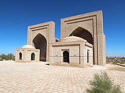 Photograph of two domed, stone mausoleums