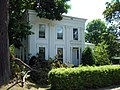 The Smith Bly House in New York state featuring Ionic pilasters, 1835.