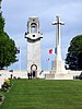 View of the memorial tower and the Cross of Sacrifice