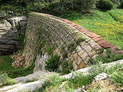 The Walnut Canyon Dam is located Southeast of Flagstaff.