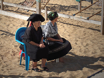 Women typical dress and headscarf; Nazaré, Portugal, 2006