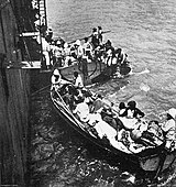 A French warship embarks Armenian refugees from Musa Dagh in September 1915.