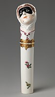 "Toy" needlecase with the head of Columbina, c. 1760, height: 4+7⁄8 inches (12 cm). Inscribed on enamel band on mount: NE SOYEZ POINT CRUELE ("Don't be so cruel")