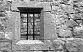 Window with medieval inscription