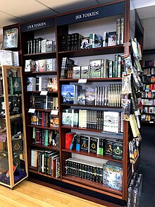 Books written by J. R. R. Tolkien on a bookshelf