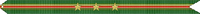 A green streamer with red, gold, and blue horizontal stripes and four stars in the center