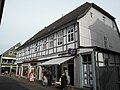 Fachwerkwohn- u. Geschäftshaus, Hanekamp 1, Brakel, (Liste der Baudenkmäler in Brakel)