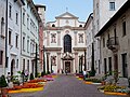 Chiesa di San Francesco Saverio (St. Francis Xavier Church). The street is via Belenzani connecting the church façade with Piazza Duomo