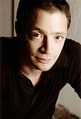 Promotional picture of Joshua Malina.