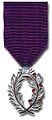 médaille de chevalier de l’ordre des Palmes académiques.