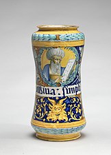 Faentine albarello jar with white-bearded turbaned physicians and trophies of arms, 16th century