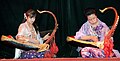 Image 17Two female musicians play the saung at a performance in Mandalay. (from Culture of Myanmar)