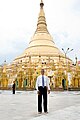 Image 27Former US President Barack Obama poses barefoot on the grounds of Shwedagon Pagoda, one of Myanmar's major Buddhist pilgrimage sites. (from Culture of Myanmar)