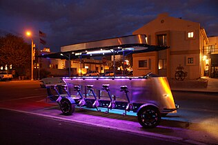 A photo of Pedal Cruiser taken at night in Arizona with flashing LED lights turned on