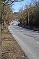 Blick von Südosten von der Straße Poppenbütteler Berg auf die Mellingbekbrücke. Diese quert die Mellingbek und verbindet die Straßen Poppenbütteler Berg in Hamburg-Poppenbüttel und Lemsahler Landstraße in Hamburg-Lemsahl-Mellingstedt.