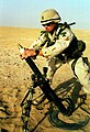 Soldier firing M224 60mm mortar