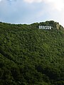 The famous Hollywood-like sign on top of Mt. Tâmpa