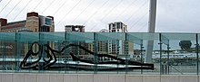 Picture of a reclining nude on the Gateshead Millennium Bridge by Julian Opie. Similar designs were used in the B.OPEN event in Baltic.