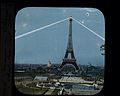 Panorama of the Champ de Mars, Paris Exposition, 1889 with the illuminated Eiffel Tower.