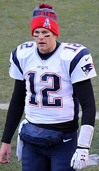 Brady wearing his uniform with a beanie