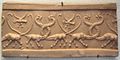 Modern clay impression of a cylinder seal with monstrous lions and lion-headed eagles (dated to c. 4100 – c. 3000 BCE).