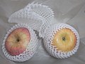 Appels verpakt in EPE foam netje