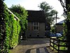 Hoeve "Boekestein". Boerderij met rechts opkamer. Twee vensters met houten kruiskozijnen. Stenen karnmolen. Inwendig een schouw met natuurstenen, gotische wangstukken en houten hoofdgestel, om de boezem. Voorts een 17e-eeuwse bedstede. Balkenzolders met sleutelstukken