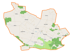 Mapa konturowa gminy Abramów, w centrum znajduje się punkt z opisem „Parafia Matki Bożej Szkaplerznej”