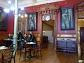 Polychrome sculptural group inside the Café Moderno