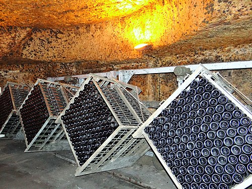 Bottles of Burgundy wine in an old quarry