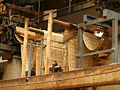 Punched cards in use in a Jacquard loom.