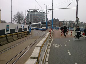 Tram 10 negotiates the gauntlet track on the temporary bridge at Hoge Sluis, Amsterdam, 3 March 2012