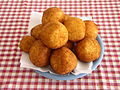 Arancini (gevulde "warme" sinaasappels)