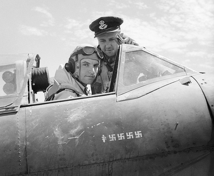 File:Flight Lieutenant Dennis Barnham of No. 601 Squadron RAF in the cockpit of his Supermarine Spitfire Mk VB at Luqa, Malta, with Pilot Officer M H Le Bas, June 1942. GM1001.jpg