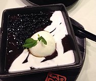 Black glutinous rice porridge served at a Hong Kong dessert shop