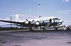 A Douglas DC-6 painted in blue and white United Airlines livery. The DC-6 is powered by four propeller engines.