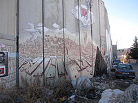 Muurschildering in Bethlehem met Bijbels visioen: Jeruzalem, stad van vrede, moeder van alle volkeren (Psalm 150)