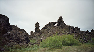 At Dimmuborgir the lava flows ponded, formed a lava tunnel and when its roof broke down strange forms remained.