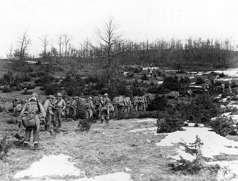 File:"D" Co. of the 85th Inf. Regt., 10th Mtn. Div., forms in unusual pattern as it winds its way up the face of Mt. Belvedere carrying heavy mortars and ammunition to throw against the stubbornly resisting enemy... (52306582936).jpg