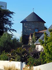 Ancien moulin restauré attenant à une maison