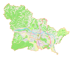 Mapa konturowa gminy miejskiej Mariboru, blisko centrum po lewej na dole znajduje się punkt z opisem „Maribor”