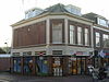 Winkel met bovenwoning