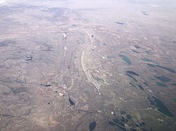 Aerial view of Larimer County, with the town of Laporte in the foreground