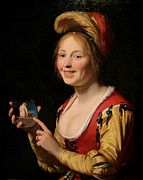 Van Honthorsts Jonge vrouw met een medaillon, eveneens uit 1625, zelfde model.