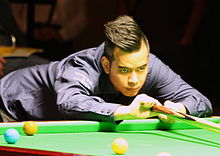 photo of Saengkham playing a shot