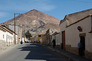 A street in Potosí with Cerro Rico in the background.