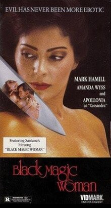 This is the cover for the 1991 VHS release, it shows Apollonia from the shoulders up, gazing at the blade of a knife that is partially visible on the box. In the blade's surface Hamill and Wyss are shown in a passionate embrace. The box also features text introducing the film's name, its three central actors, the tagline, and basic release and ratings information. It also features a box stating that the song of the same name by Santana is featured in the movie.